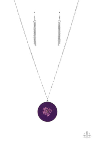 Encased in a glassy fitting, a dainty bouquet of firework flowers blooms across a plum backdrop, resulting in a colorful floral pendant at the bottom of an extended silver chain. Features an adjustable clasp closure.