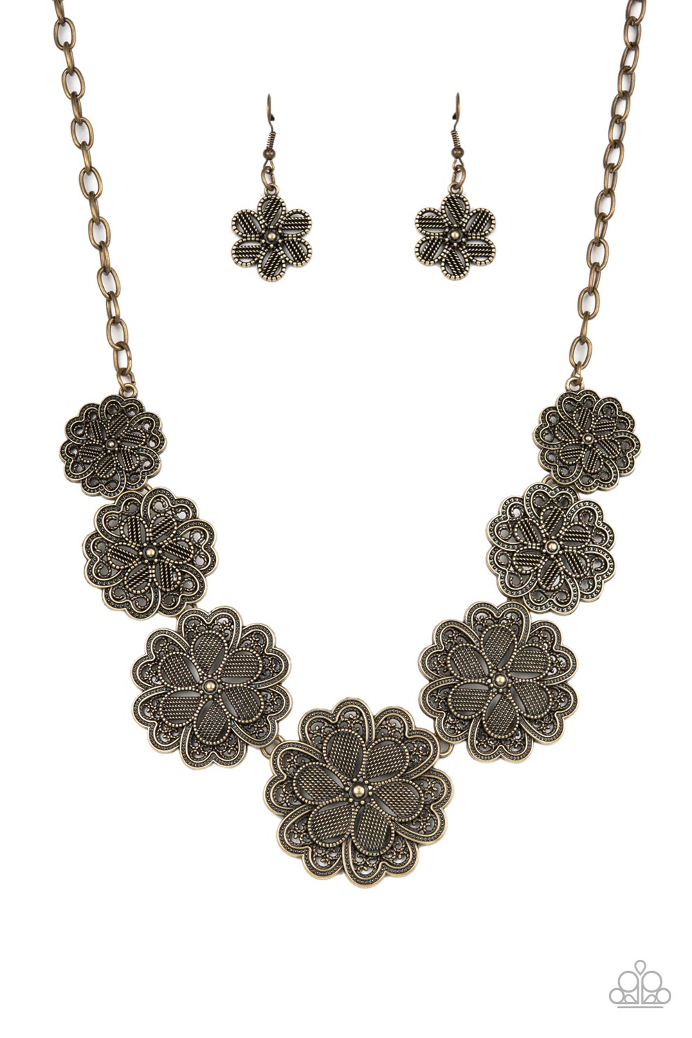 Featuring metallic wicker-like patterns, stacks of teardrop and heart shaped filigree-filled brass petals delicately link into a decorative row of flowers. The floral frames gradually increase in size as they move towards the center, creating a vintage inspired display below the collar. Features an adjustable clasp closure.