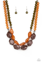 Load image into Gallery viewer, Faceted strands of cloudy brown and Olive Branch crystal-like beads give way to a colorful assortment of oversized brown and smoky black crystal-like accents. Shiny silver beads adorn the hearty layers, adding a dash of metallic glitz to the tropical inspired display. Features an adjustable clasp closure. 
