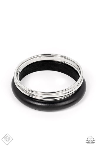 A set of three basic silver bangles stack together with a chunky black wooden bangle for a layered look.  Sold as one individual bracelet.  New Kit Fashion Fix
