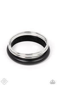 A set of three basic silver bangles stack together with a chunky black wooden bangle for a layered look.  Sold as one individual bracelet.  New Kit Fashion Fix