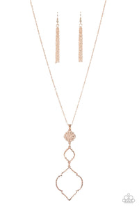 Featuring mandala-like patterns, a floral lattice frame gives way to mismatched scalloped rose gold frames, creating a magnificently stacked pendant at the bottom of an extended rose gold chain. Features an adjustable clasp closure.