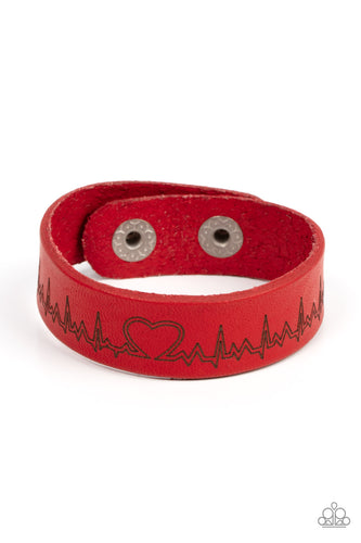 Culminating into a heart at the center, a zigzagging pattern reminiscent of a heartbeat is etched across the front of a red leather band around the wrist for a whimsical fashion. Features an adjustable snap closure. 