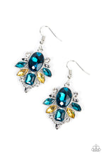 Load image into Gallery viewer, A brilliant blue gem makes a sparkling centerpiece amidst a glitzy fringe of marquise, round, and emerald cut blue, yellow, and white rhinestones resulting in a timeless lure. Earring attaches to a standard fishhook fitting. 
