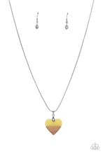 Load image into Gallery viewer, The tip of a yellow acrylic heart attaches to a wooden accent, resulting in a colorfully free-spirited pendant below the collar. Features an adjustable clasp closure.
