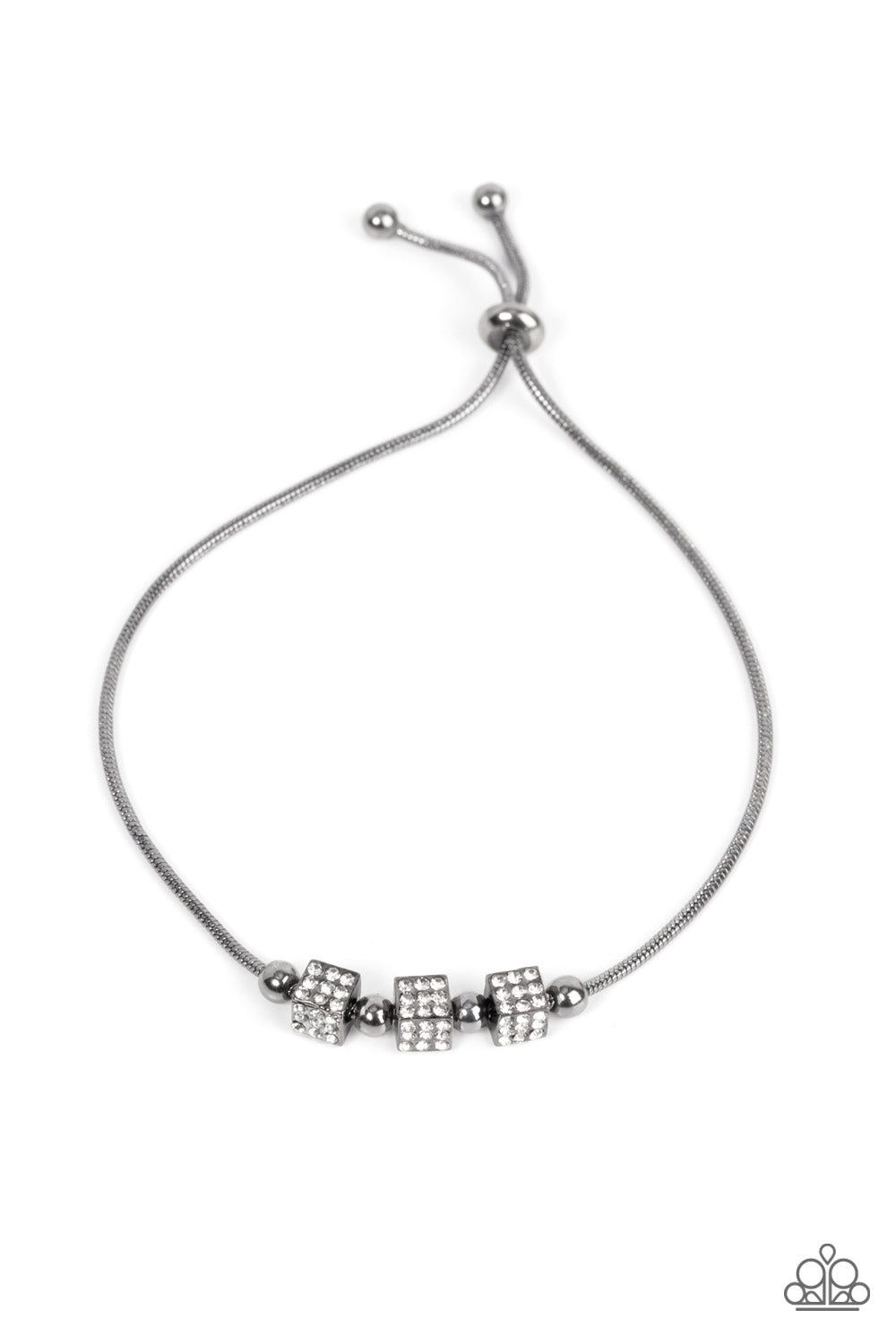 Dainty gunmetal beads and white rhinestone encrusted gunmetal cubes slide along a rounded gunmetal snake chain around the wrist, resulting in a radiant centerpiece. Features an adjustable sliding bead closure. 