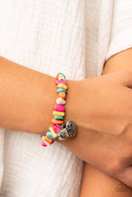 Load image into Gallery viewer, Infused with a hammered silver bead and a decorative silver heart charm, an earthy collection of multicolored pebbles are threaded along a stretchy band around the wrist for a whimsical fashion.
