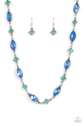 Encased in sleek silver fittings, an opalescent collection of blue marquise and green square cut rhinestones delicately links below the collar for a prismatic pop of color. Features an adjustable clasp closure.