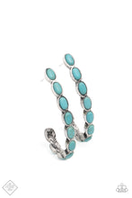 Load image into Gallery viewer, Small turquoise stones pressed into simple silver oval frames stack end to end as they fall from the ear and delicately curve into a J-shaped hoop for a refreshing finish. Earring attaches to a standard post fitting. Hoop measures approximately 1&quot; in diameter.  Sold as one pair of hoop earrings.  Fashion Fix
