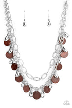 Load image into Gallery viewer,  A pair of mismatched chunky silver chains layer below the collar. Shiny silver teardrop beads and brown shell-like discs dance from the bottom of the lowermost chain, creating a tropical inspired fringe. Features an adjustable clasp closure.
