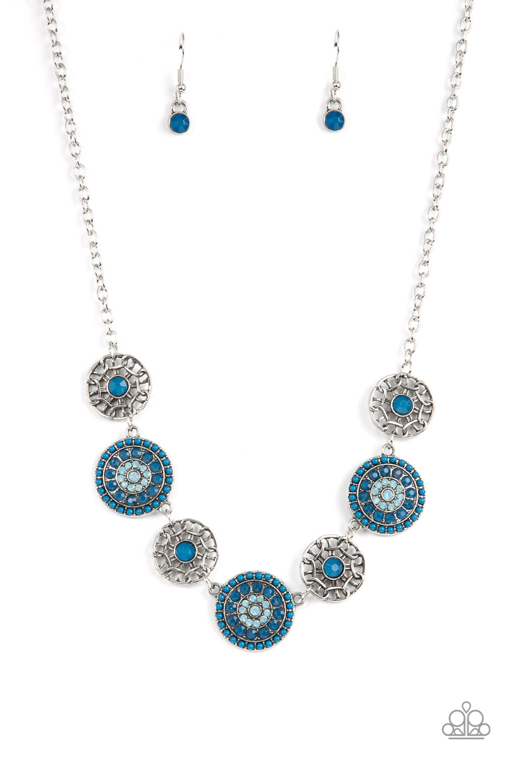 Bursts of faceted Mykonos Blue beads and sparkling opal blue rhinestones radiate from the centers of antiqued silver frames, while smaller airy frames are dotted with Mykonos Blue centers. The whimsical designs alternate around the collar making a dazzling display. Features an adjustable clasp closure.