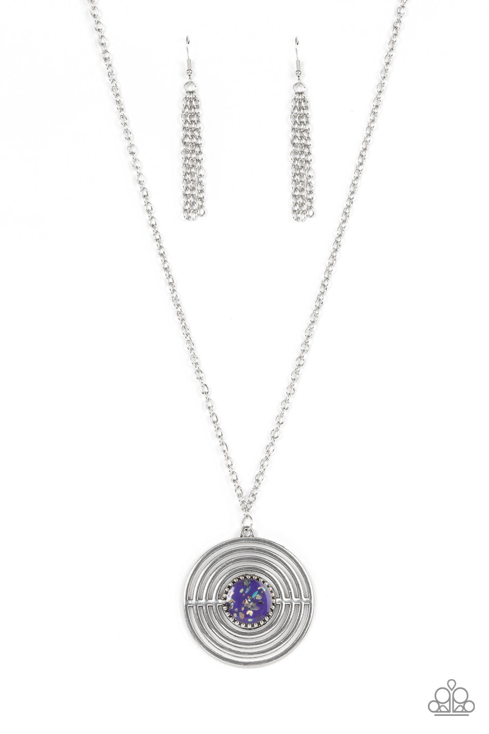 Flecked in iridescent shell-like accents, a studded purple frame adorns the center of an oversized silver pendant rippling with concentric circles at the bottom of an extended silver chain for a dizzying pop of color. Features an adjustable clasp closure.