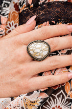 Load image into Gallery viewer, An earthy brown and white marbled stone is pressed into a rustic brass frame adorned with rope-like texture, creating a rustic centerpiece atop the finger. Features a stretchy band for a flexible fit.  Sold as one individual ring.
