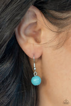 Load image into Gallery viewer, A lengthened silver chain flows into a succession of polished turquoise beads and silver accents. The flowy display gives way to an opulent turquoise stone that is pressed into an ornate silver frame. Adorned with fanciful antiqued silver flower, vine, and feather-like motifs, the elegantly rustic pendant makes a striking impact. Features an adjustable clasp closure.  Sold as one individual necklace. Includes one pair of matching earrings.  New Kit Fashion Fix
