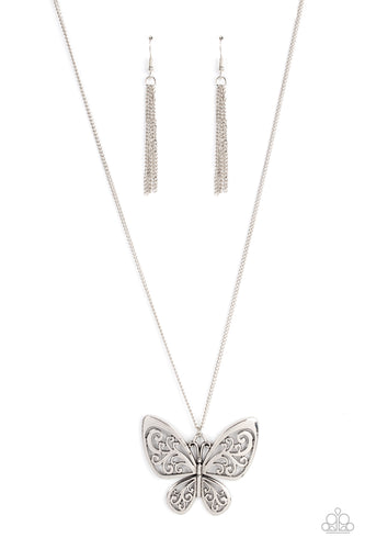 Filled with frilly filigree details, a rustic silver butterfly flutters from the bottom of an extended silver chain for a whimsical fashion. Features an adjustable clasp closure.