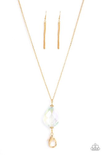 A dramatically oversized iridescent teardrop gem swings from the bottom of a lengthened gold chain, resulting in out-of-this-world sparkle. A lobster clasp hangs from the bottom of the design to allow a name badge or other item to be attached. Features an adjustable clasp closure.