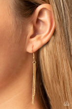 Load image into Gallery viewer, A dramatically oversized iridescent teardrop gem swings from the bottom of a lengthened gold chain, resulting in out-of-this-world sparkle. A lobster clasp hangs from the bottom of the design to allow a name badge or other item to be attached. Features an adjustable clasp closure.
