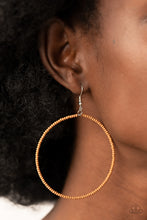 Load image into Gallery viewer, Dainty brown seed beads are delicately threaded along a silver wire hoop, creating a neutral pop of color. Earring attaches to a standard fishhook fitting.
