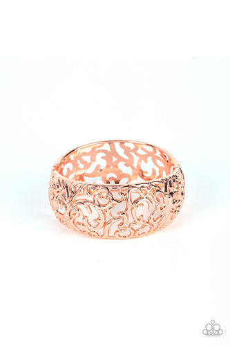Shiny copper vine-like filigree enchantingly twines across the centers of two airy shiny copper frames that delicately hinge into a bangle-like bracelet, resulting in a regal centerpiece. Features a hinged closure.