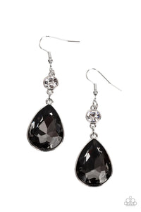 Encased in a sleek silver frame, a dramatically oversized smoky teardrop gem swings from a solitaire white rhinestone for an unapologetic sparkle. Earring attaches to a standard fishhook fitting.