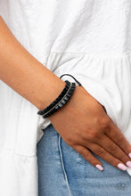 Load image into Gallery viewer, Infused with a dainty strand of silver ball chain, a ribbon of black leather gathers into a pleated bracelet around the wrist for a rustic flair. Features an adjustable sliding knot closure.
