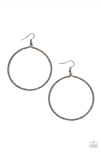 Dainty gunmetal seed beads are delicately threaded along a gunmetal wire hoop, creating a causal pop of metallic shimmer. Earring attaches to a standard fishhook fitting.
