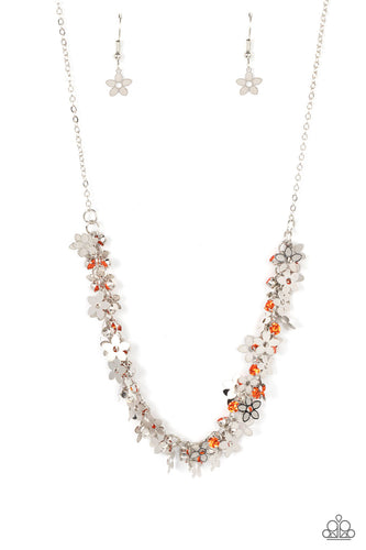 Featuring textured petals, a dainty collection of silver flower frames and glassy orange rhinestones delicately cluster along the bottom of a silver chain for a flirtatious floral look below the collar. Features an adjustable clasp closure.