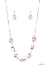Load image into Gallery viewer,  Featuring asymmetrical faceted finishes, a shimmery collection of shiny silver and iridescent purple beads links below the collar for an interstellar inspired fashion. Features an adjustable clasp closure.
