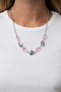  Featuring asymmetrical faceted finishes, a shimmery collection of shiny silver and iridescent purple beads links below the collar for an interstellar inspired fashion. Features an adjustable clasp closure.