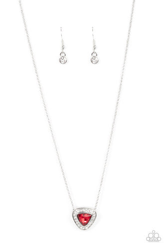 Bordered in glassy white rhinestones, a triangular cut red gem sparkles at the bottom of a dainty silver chain for a timeless twinkle below the collar. Features an adjustable clasp closure. 