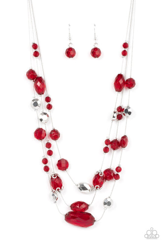 Varying in shape and size, a variety of faceted silver beads and Fire Whirl crystal-like accents are fitted in place along layers of silver wire-like chain, resulting in a prismatic pop of color. Features an adjustable clasp closure. 