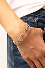 Load image into Gallery viewer, Spontaneously interrupted by glistening gold beads, a sparkly strand of white rhinestones coils around the wrist, resulting in an irresistible infinity wrap bracelet.
