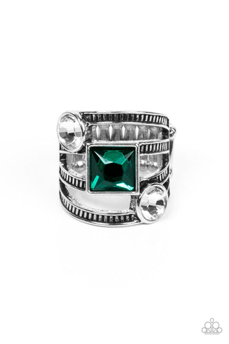 A row of oversized round white and square green rhinestones slant across layers of textured silver bands, stacking into a glitzy frame atop the finger. Features a stretchy band for a flexible fit.