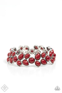 A flourishing collection of red oval, round, and teardrop beads coalesce into abstract floral-inspired frames. The enchanting frames, threaded along stretchy bands, add a vivacious pop of color around the wrist.  Sold as one individual bracelet.