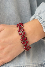 Load image into Gallery viewer, A flourishing collection of red oval, round, and teardrop beads coalesce into abstract floral-inspired frames. The enchanting frames, threaded along stretchy bands, add a vivacious pop of color around the wrist.  Sold as one individual bracelet.
