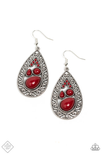 A mismatched collection of smooth red beads gathers inside a daintily dotted teardrop frame. An artful border of airy serpentine filigree encompasses the collection, making for a timeless design with a vintage vibe. Earring attaches to a standard fishhook fitting.  Sold as one pair of earrings.