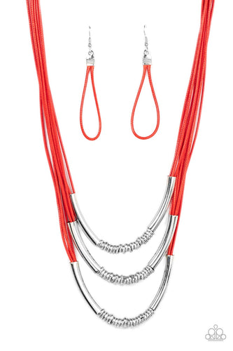 An edgy collection of silver rods and silver rings glide along strands of shiny red cording across the chest, resulting in an urban industrial display. Features an adjustable clasp closure. 
