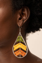 Load image into Gallery viewer, Colorful sections of shiny Olive Branch, mustard, and Adobe threads decoratively weave along arched silver bars inside of a shiny silver teardrop, resulting into an earthy lure. Earring attaches to a standard fishhook fitting.
