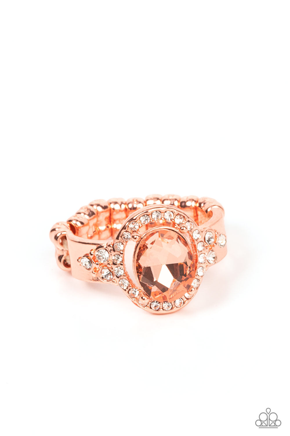 Reminiscent of an engagement ring, a coppery oval gem is showcased atop a white rhinestone encrusted shiny copper setting for an elegantly stellar finish. Features a dainty stretchy band for a flexible fit.