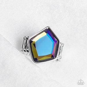 Featuring a purple UV finish, a faceted geometric multicolored gem sits asymmetrically atop the finger for a stellar finish. Features a stretchy band for a flexible fit.