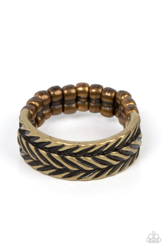 Etched in rustic patterns, slanted rows of chevron-like textures alternate across a dainty brass band. The centermost row is raised, adding 3-dimensional detail to the rustic centerpiece. Features a dainty stretchy band for a flexible fit. 