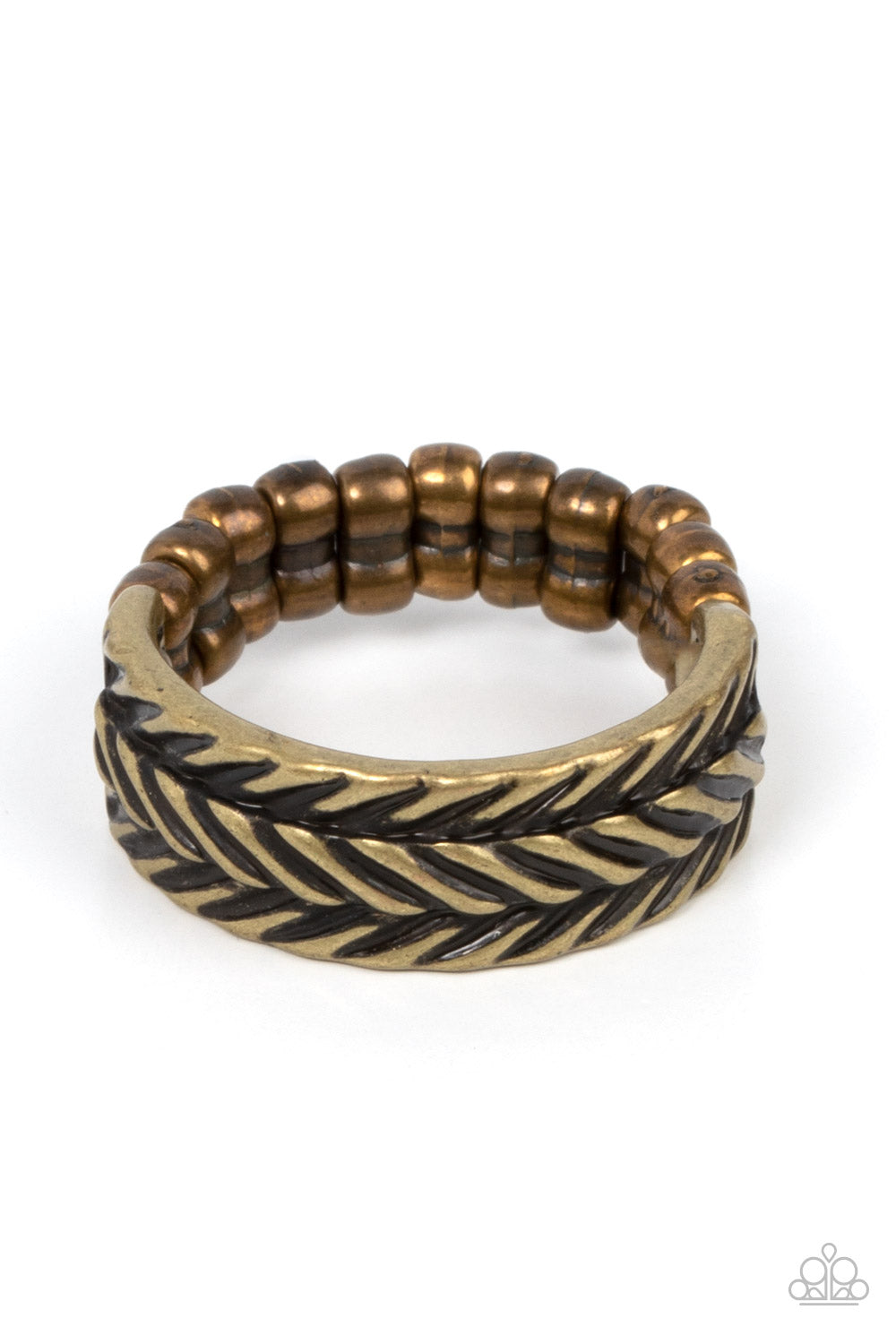 Etched in rustic patterns, slanted rows of chevron-like textures alternate across a dainty brass band. The centermost row is raised, adding 3-dimensional detail to the rustic centerpiece. Features a dainty stretchy band for a flexible fit. 