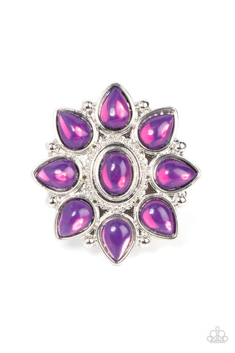 Dewy purple teardrop beads bloom from a matching oval beaded center, resulting in an ethereal floral pattern atop a studded silver backdrop. Features a stretchy band for a flexible fit.