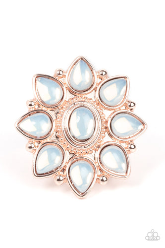 Dewy opal teardrop beads bloom from a matching oval beaded center, resulting in an ethereal floral pattern atop a studded rose gold backdrop. Features a stretchy band for a flexible fit.