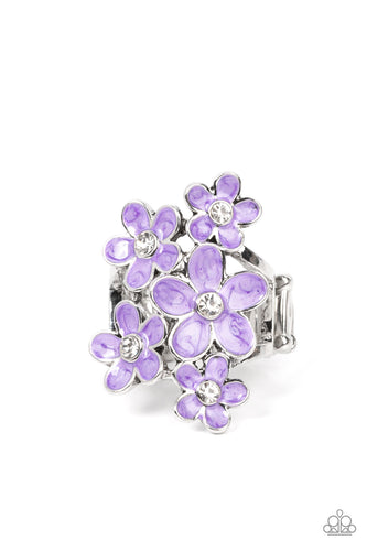 Dotted with dainty white rhinestone centers, a bouquet of shiny purple flowers blooms across the finger for a sensational seasonal look. Features a stretchy band for a flexible fit.