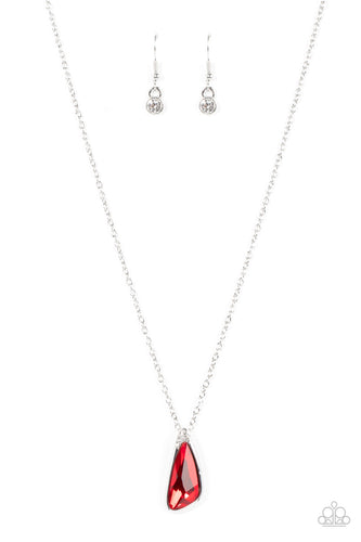 An asymmetrical red gem is pressed into a shiny silver frame dusted in glassy white rhinestones, resulting in a refined pendant at the bottom of a dainty silver chain. Features an adjustable clasp closure.