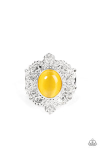 Embossed in an enchanting heart motif, a frilly silver frame is adorned with a dreamy yellow cat's eye stone center for a magical pop of color atop the finger. Features a stretchy band for a flexible fit.