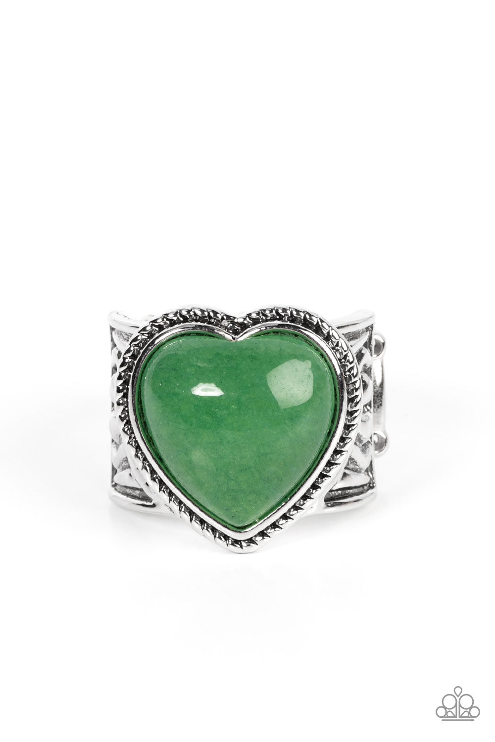 A heart shaped jade stone adorns the center of a textured frame atop a thick silver band embossed in indigenous inspired details, resulting in an earthy pop of color atop the finger. Features a stretchy band for a flexible fit.