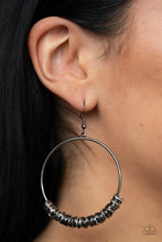 Load image into Gallery viewer, An abundance of miniature gunmetal and silver rings slide around a simple gunmetal front-facing hoop, resulting in a polished industrial vibe. Earring attaches to a standard fishhook fitting.
