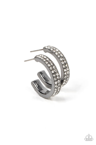 Two rows of glassy white rhinestones encrust the front of a dainty gunmetal hoop, resulting in a timeless twinkle. Earring attaches to a standard post fitting. Hoop measures approximately 3/4